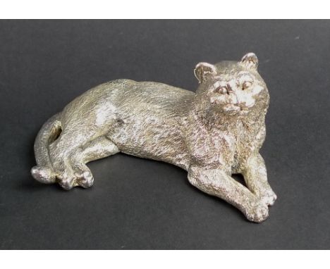 A sterling silver model of a long haired cat, base stamped with monogram LGW and 925, 11cm long, 3.45toz.