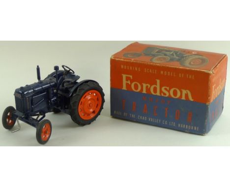 A Chad Valley Co Ltd, Harborne, 'Working Scale Model of the Fordson Major Tractor', painted dark blue with red wheels and rub