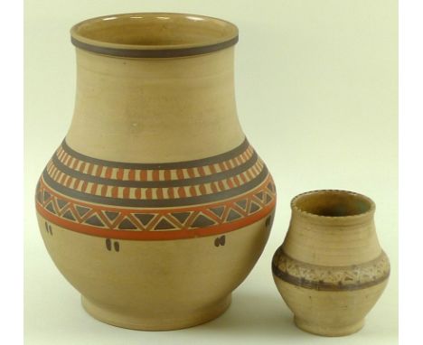 Two very early Poole pottery vases, Egyptian designs, the smaller of the two with central brown geometric band, oxidised copp