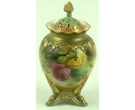 A Royal Worcester porcelain pot pourri and cover of ovoid form, the pierced cover with rose finial, the body painted with ros
