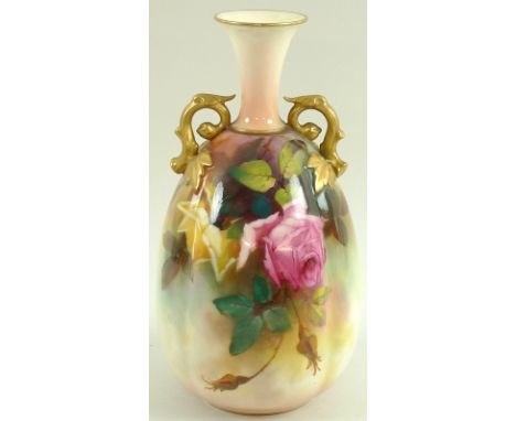 A Royal Worcester double handled vase of lobed form with gilded scrolled vine handles, the body painted with roses, green mar