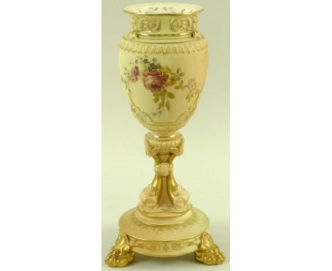 A Royal Worcester blush ivory handled vase, the lobed form body painted with roses, forget-me-nots and clematis, with pierced