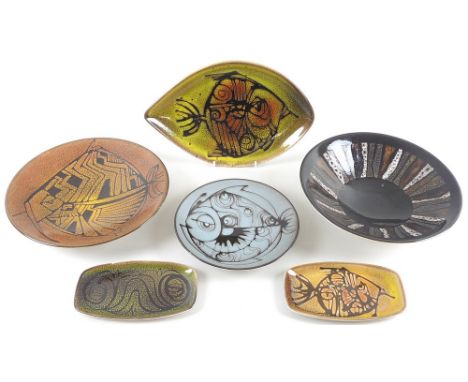 A selection of Poole pottery in Aegean pattern comprising a fish pattern burnt orange glazed charger, marked 4, a deep brown 