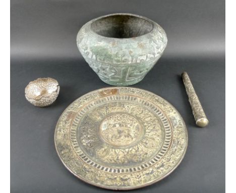 A selection of 19th century Asian and Indo-Persian metalware including a white metal parasol handle, chased and embossed over