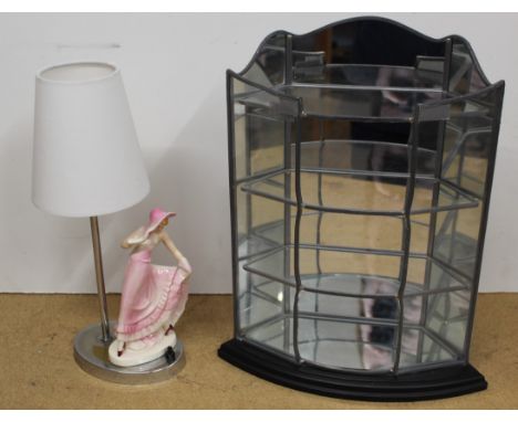 A lead lined glass small display stand, 42cm high plus a table lamp with ceramic figurine