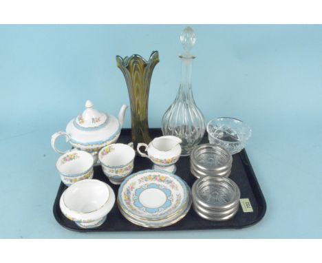 A Staffordshire Crown bone china tea set comprising a teapot, milk jug, sugar bowl and two cups with saucers, together with a