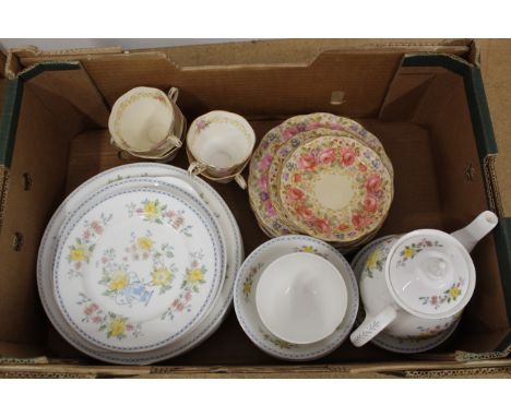 A Royal Albert 'Serena' pattern part tea set, five cups, six saucers, six side plates and six other plates plus a Royal Graft