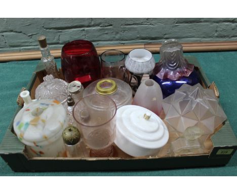 A selection of glass lamp shades, vases, etc