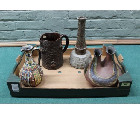 A Studio pottery twin necked vase, a tree form pottery jug, an enamel decorated jug plus a serpentine stone lamp base formed 