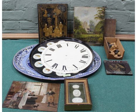 Two printed tin trays, three framed Grand Tour classical intaglios, a part chess set, a Japanese papier mache blotter, unfram