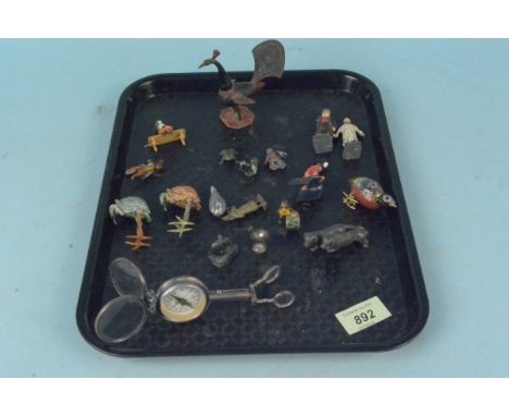 A collection of cold painted metal animals and figures including a peacock container (neck screws off), a pair of birds and c