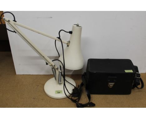 A cream coloured Anglepoise lamp plus a Mamiya/Sekor 35mm camera in case