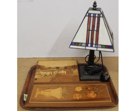 An Art Deco style table lamp with stained glass shade plus two small marquetry pictures
