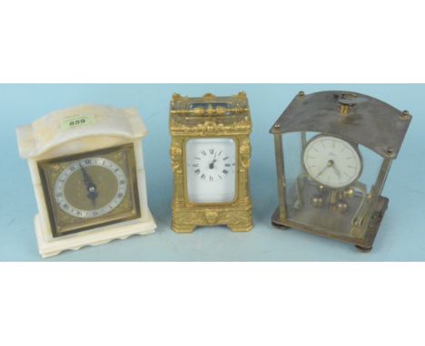A Kein West Germany brass cased mantel clock, an onyx cased Elliot mantel clock plus a heavily gilded carriage clock with key