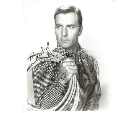 George Montgomery signed 10 x 8 black and white portrait photo. Good Condition. All autographs are genuine hand signed and co