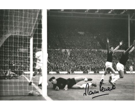Football Martin Peters 12x8 signed black and white photo pictured in action for West Ham United in the 1965 European Cup Winn