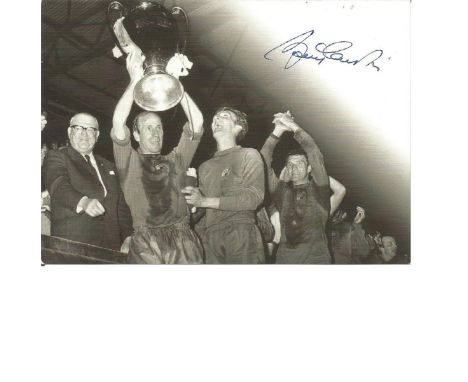 Bobby Charlton signed 6 x 6 b/w Man United football photo Cup celebration. Good Condition. All autographs are genuine hand si