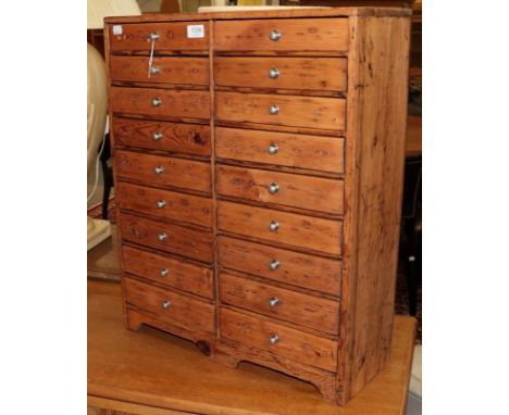 A Victorian pine eighteen drawer chest, suitable for watch makers tools 