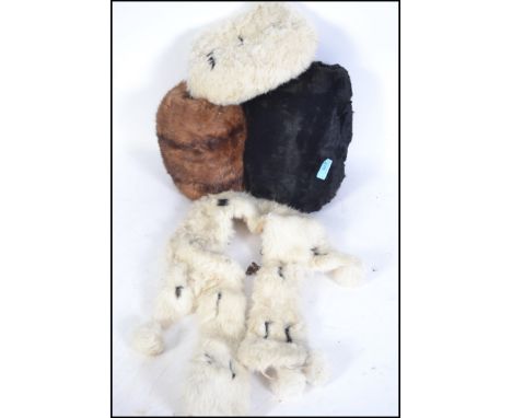 Two vintage early to mid 20th century fur pelt &nbsp;muffs. Both of different furs.