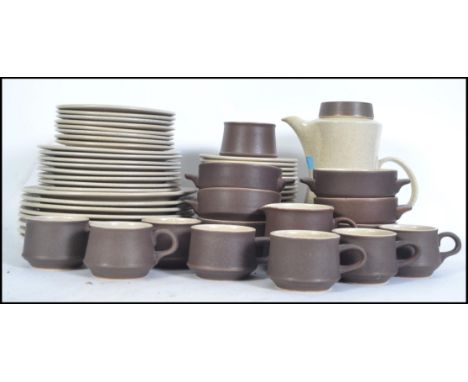 A Purbeck Pottery nine person Brown Diamond Purbeck service, to include dinner plates, side plates, coffee pot, cups, sugar b