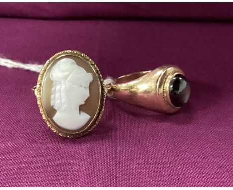 An Oval Shell Carved Cameo Ring, depicting female profile, collet set (finger size R); together with a single stone ring, ova