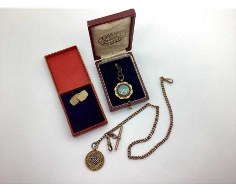A Curb Link Watch Chain, stamped "9ct", to swivel clasps (stamped "9ct") suspending a T-bar stamped "9ct" and a 9ct gold meda