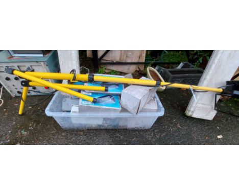 A crate containing a quantity of electric bulkhead lights - sold with a telescopic site light on tripod stand