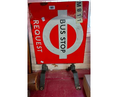 An original London Transport two sided enamel Request bus stop sign and bracket mount with white and black lettering on red g