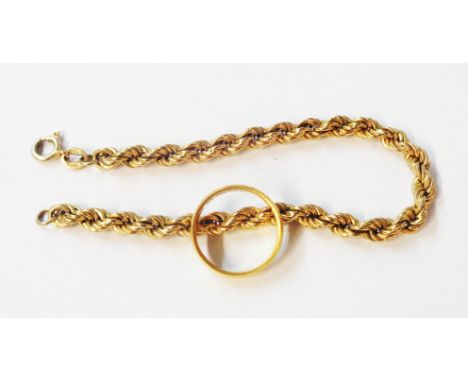A 22ct. gold wedding band - size M 1/2 - sold with a 9ct. gold rope-twist bracelet