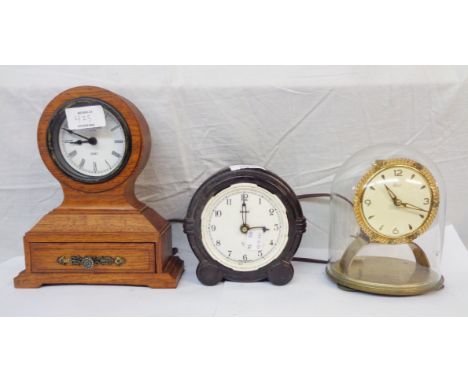 A vintage Kundo squat anniversary clock - pendulum missing - sold with a Ferranti Bakelite cased electric timepiece and a mod