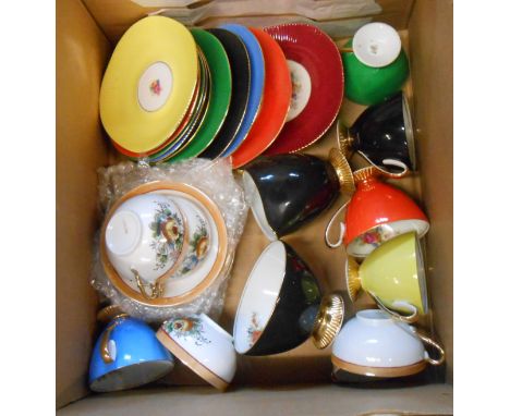 A box containing a quantity of assorted ceramic items including cups and saucers, etc.