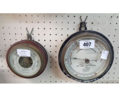 A vintage Dolland 'Life Boat Institution' bulkhead barometer with aneroid works - dial a/f - sold with a smaller C. Plath cir