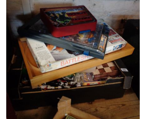 A box containing a quantity of vintage children's toys including MB Games Battleships, Transformers pinball, wooden Bagatelle