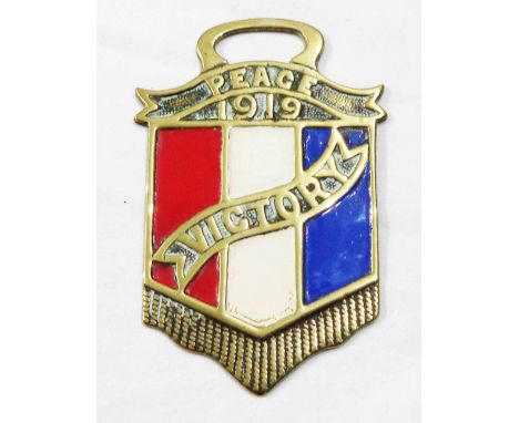 A WWI period Victory commemorative horse brass with polychrome enamel decoration