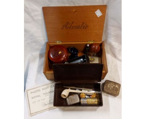 A wooden box containing a quantity of collectable items including vintage Double Diamond bottle form bottle opener, eye baths