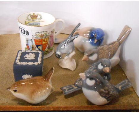 Three Royal Copenhagen bird figurines, a Goebel similar and another - sold with a small Wedgwood blue jasper trinket box and 
