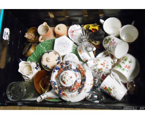 A crate containing a quantity of ceramic and glass items including Mason's ironstone teapot, jug, etc.