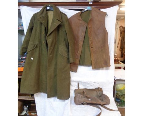 A WWII Army great coat - sold with a leather Tanker jerkin and a leather kit bag