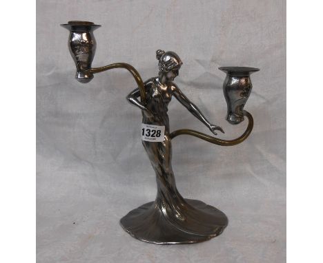 An Art Nouveau WMF silver plated twin branch candelabrum in the form of a maiden with flowing robes