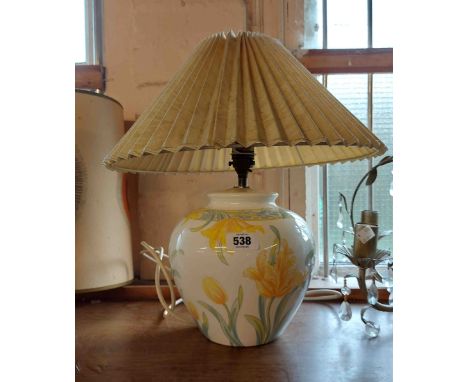 A ceramic table lamp of vase form, with transfer printed floral decoration - sold with shade