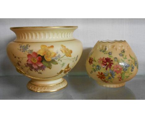 A Royal Worcester vase of urn form, with hand painted floral decoration on a peach bloom ground - sold with a smaller similar