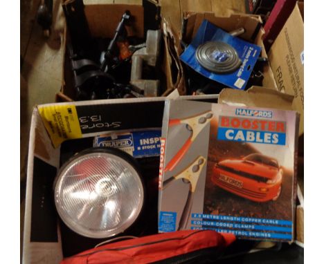 Three boxes containing a quantity of motoring accessories including jump leads, halogen lamp, etc.