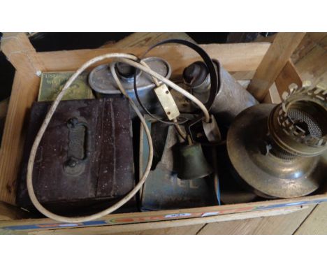 A wooden crate containing a quantity of collectable items including old brass servant's bell, Bakelite topped butter churn, b