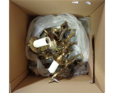 A box containing four cast brass Rococo style electric wall sconces and two lustre drop light shades and spare lustres