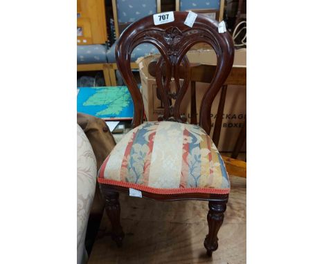 An Eastern hardwood framed 'Teddy' chair with upholstered seat and Chippendale style splat back, set on turned and reeded fro