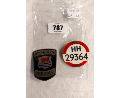 A vintage enamel Morris Ten Four car badge - sold with a public service vehicle bus driver badge