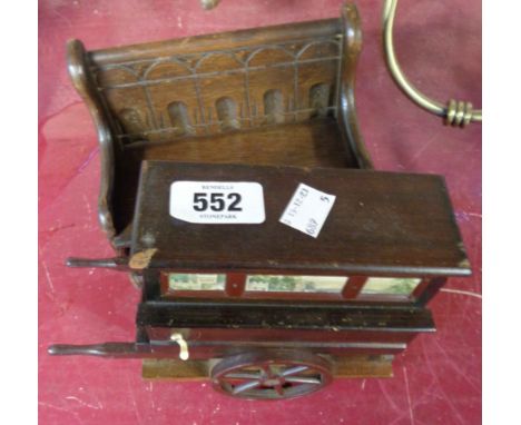 A vintage musical box in the form of a street organ - sold with another in the form of an antique bench seat
