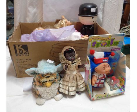 A box containing a quantity of vintage and later children's toys including Furby, Barbies, etc.