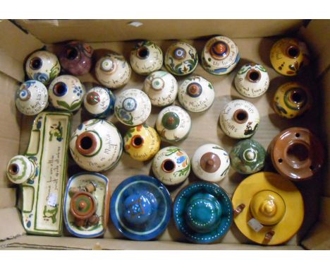 A box containing a large quantity of Torquay pottery inkwells and desk stands of various size and form - various makers inclu