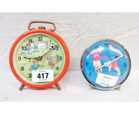 A vintage football themed 'Peter' alarm clock in red painted metal case - sold with another a/f